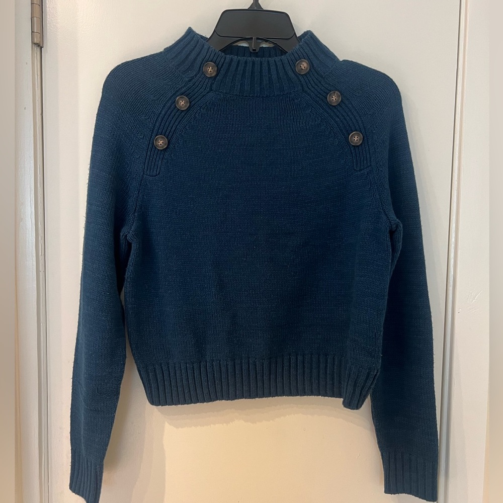 Blue sweater with button design